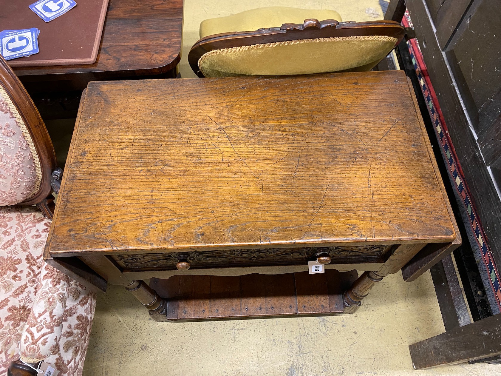 An 18th century style oak drop flap two tier side table, width 78cm, depth 42cm, height 77cm
